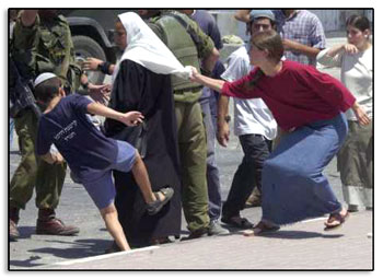 Jewish settlers harrassing a Palestinian woman